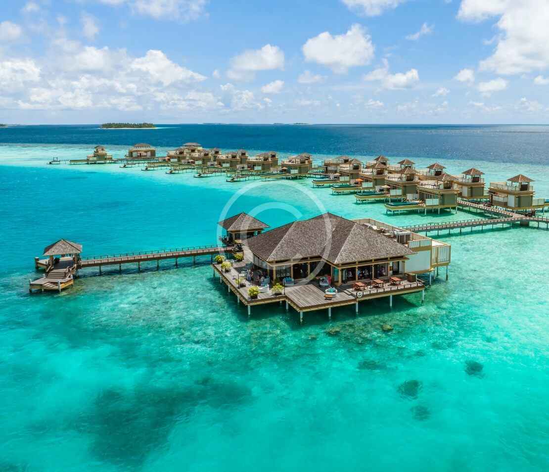 A resort with many water bungalows and piers