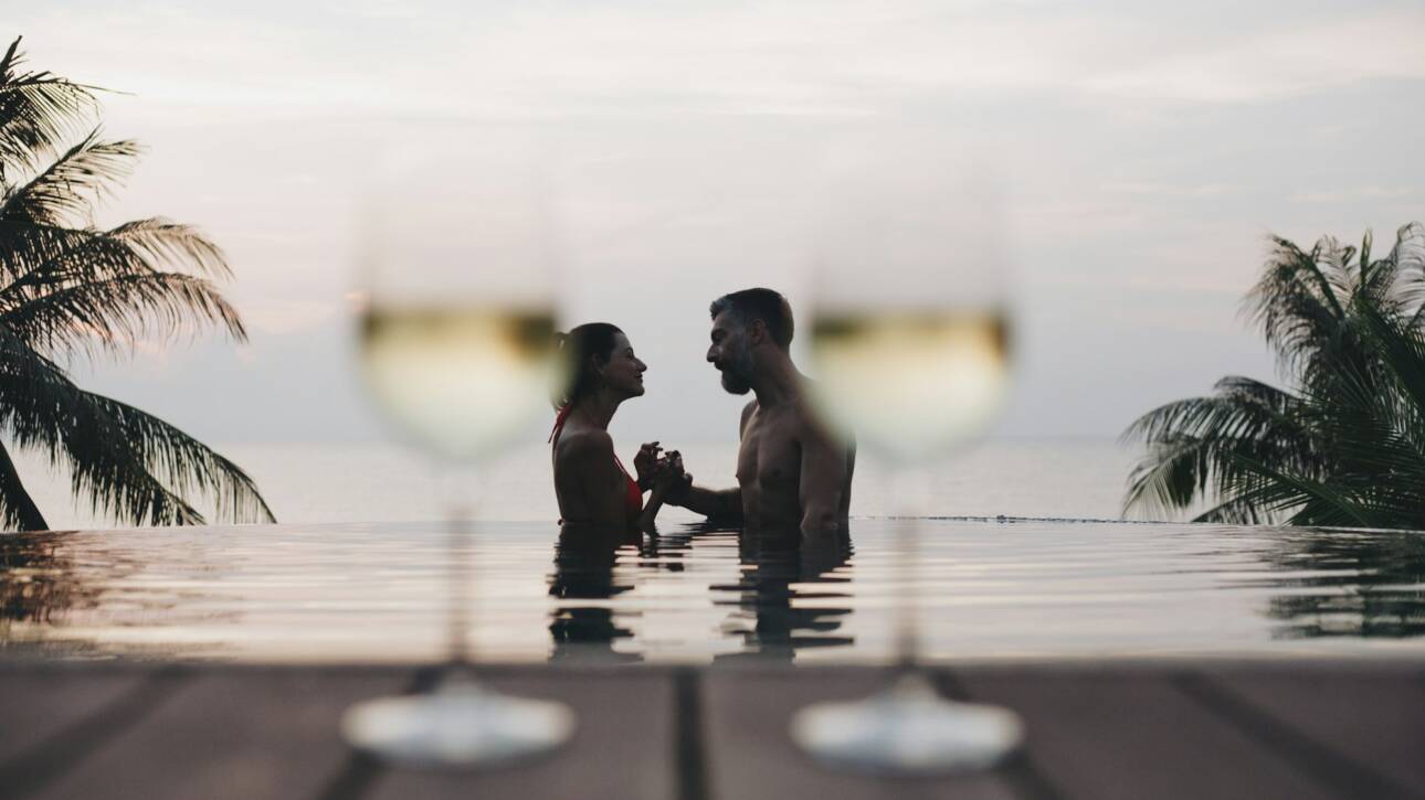 Couple enjoying a romantic sunset
